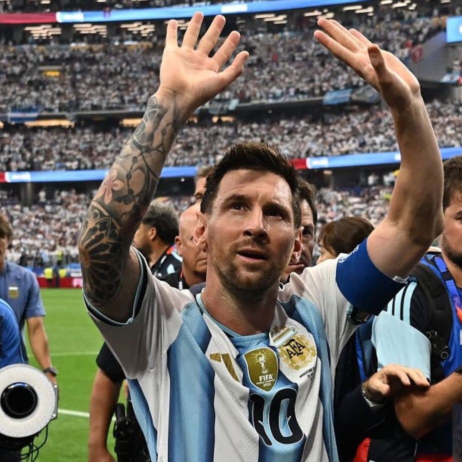 Lionel Messi breaks several football records to help holders Argentina beat Austria 2-0 